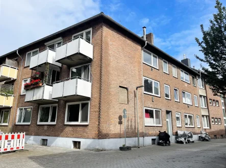 Seitenansicht - Haus kaufen in Wesel - Individualität für Ihre Mieter! Mehrfamilienhaus in Wesel