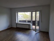 Wohnzimmer mit Balkon OG