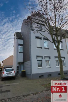 Objekt-Nr.: 8707 - Wohnung kaufen in Dinslaken - Charmante 3,5-Zimmer-Wohnung mit zusätzlichem Spitzboden