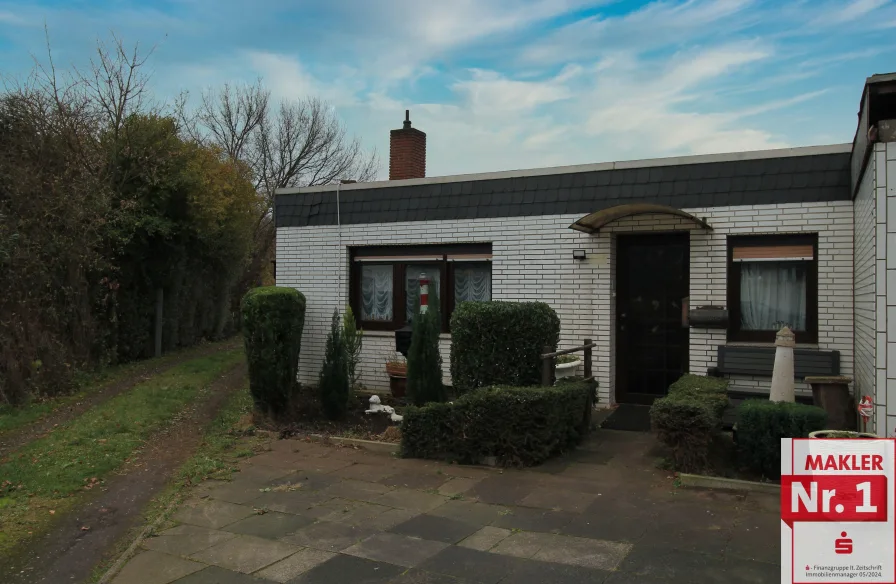 Bungalow 8692 - Haus kaufen in Dinslaken - Bungalow mit Potenzial: Ihr Traumhaus zum Selbergestalten