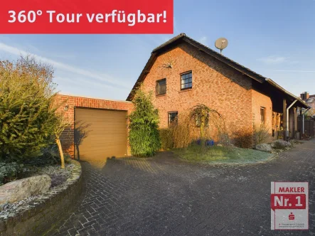 Eingangsansicht - Haus kaufen in Hamminkeln - Super Lage, großes Grundstück und eine großzügige Aufteilung!