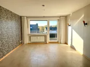 Wohnzimmer mit Zugang zum XXL-Balkon