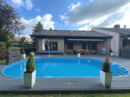 Willkommen im Paradies - Haus kaufen in Duisburg - Schönes EFH mit viel Platz und Pool im heiß begehrten Baerl!