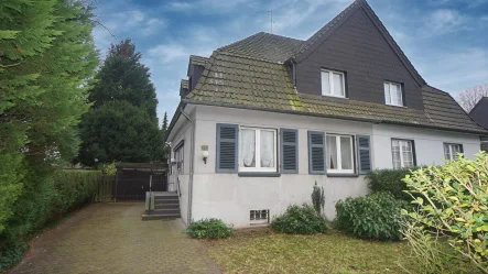 Hausansicht - Haus kaufen in Duisburg - Gepflegtes Haus mit tollem Garten sucht nette Familie