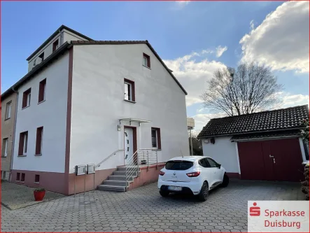 Vorderansicht - Haus kaufen in Duisburg - ** Ideal als Mehrgenerationenhaus **