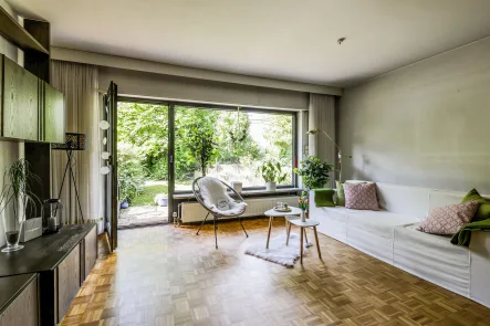 Wohnzimmer im EG - Haus kaufen in Essen - Rd. 170 m² Reihenendhaus mit Fernwärme + schönem Garten in Sackgassenlage