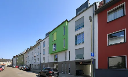 Straßenansicht - Wohnung kaufen in Essen - Baujahr 2010! Großzügige Wohnung im 1. OG mit Fernwärme, Aufzug, Tageslichtbad und großer Loggia 