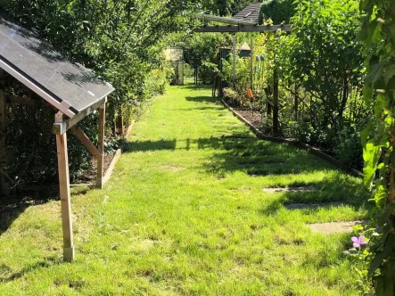 Verbringen  Sie entspannte Stunden... - Haus kaufen in Düsseldorf - Gemütliches Reihenendhaus mit traumhaftem Garten...