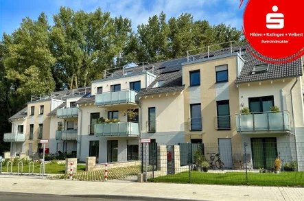 Vorderansicht - Wohnung kaufen in Hilden - Energiesparende Erdgeschosswohnung mit Terrasse und Garten!