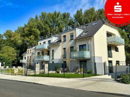 Vorderansicht - Wohnung kaufen in Hilden - Moderne Dachgeschosswohnung mit Blick ins Grüne!