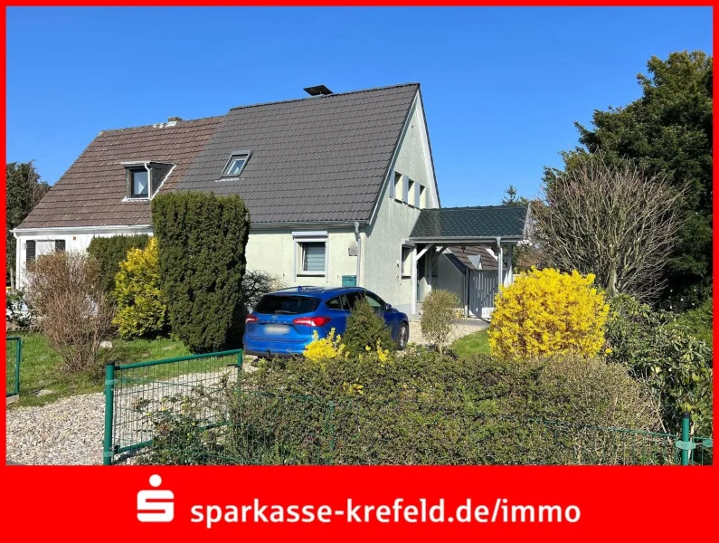 Front - Haus kaufen in Krefeld - Doppelhaushälfte auf Traumgrundstück 