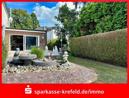 Rückansicht - Haus kaufen in Krefeld - Bungalow mit Garage 