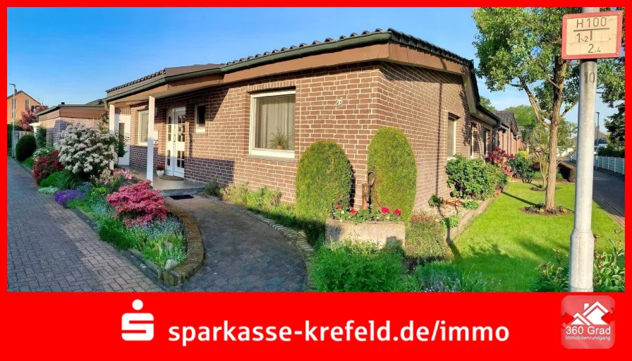 Straßenansicht - Haus kaufen in Issum - Bungalow mit Garage