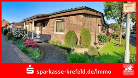 Straßenansicht - Haus kaufen in Issum - Bungalow mit Garage