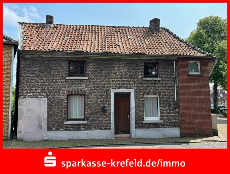 Straßenansicht - Haus kaufen in Kamp-Lintfort - Sanierungsbedürftiges Wohnhaus