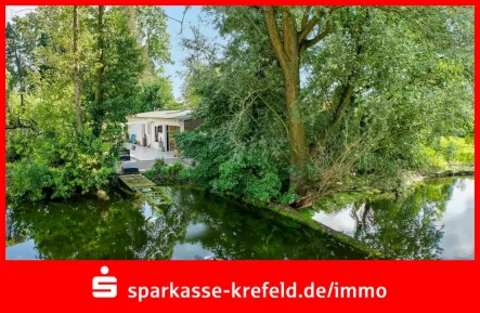 Seeansicht - Haus kaufen in Rheurdt - Rarität: Ferienhaus am See