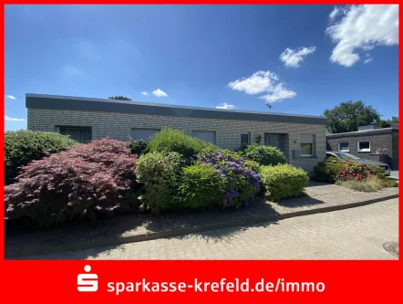 Frontansicht - Haus kaufen in Krefeld - Bungalow mit Garage