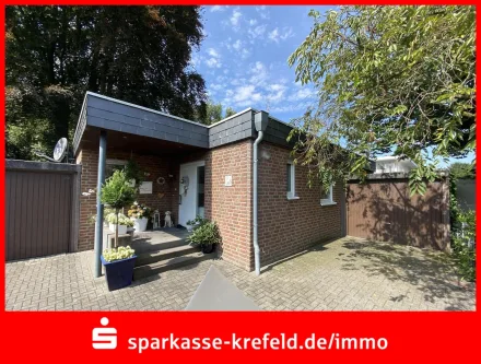 Frontansicht - Haus kaufen in Willich - Bungalow mit Garage