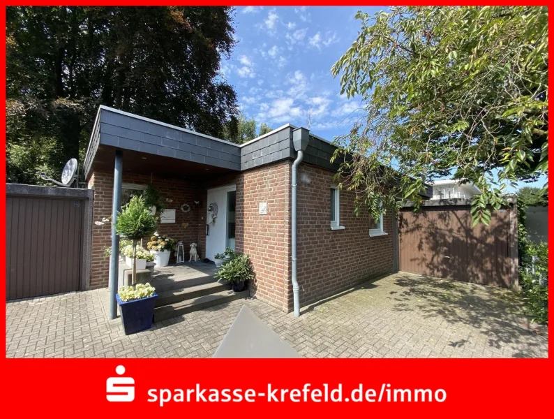 Frontansicht - Haus kaufen in Willich - Bungalow mit Garage