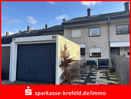 Außenansicht - Haus kaufen in Krefeld - Reihenmittelhaus mit Garage