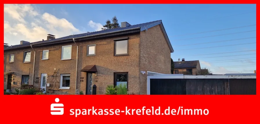 Frontansicht - Haus kaufen in Krefeld - Reihenendhaus mit Garage