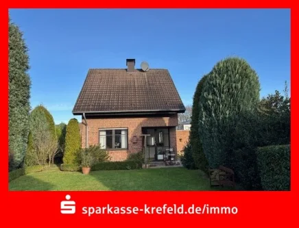 Rückansicht - Haus kaufen in Kempen - Kleines, freistehendes Einfamilienhaus mit Garage