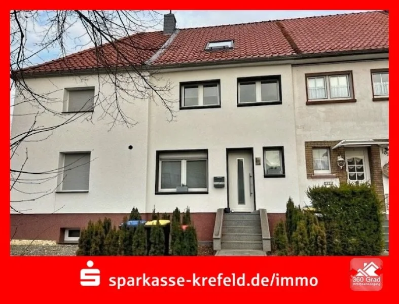 Straßenansicht - Haus kaufen in Kamp-Lintfort - Modernisiertes Zechenhaus mit Garage