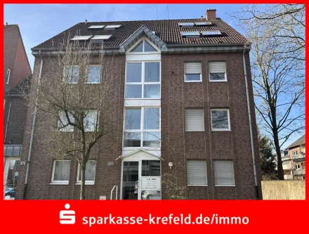 Vorderansicht - Wohnung kaufen in Krefeld - 2- bis 3-Zimmer-Maisonettewohnung mit TG-Stellplatz