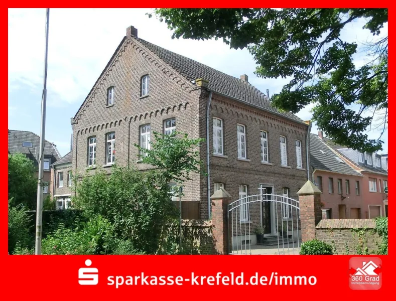 Straßenansicht - Haus kaufen in Issum - Repräsentatives Einfamilienhaus mit Einliegerwohnung