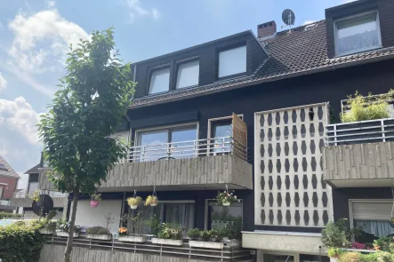  - Wohnung kaufen in Kaarst - Charmant und groß: Maisonette mit Balkon