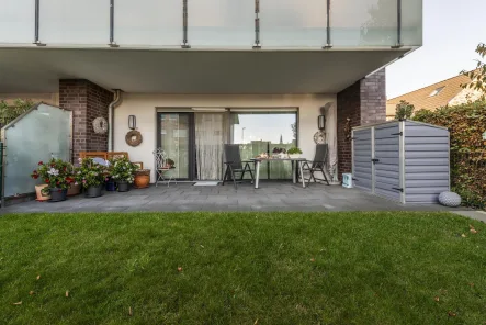 Terrasse mit Garten - Wohnung kaufen in Rommerskirchen - Willkommen im Gillbach-Carrée