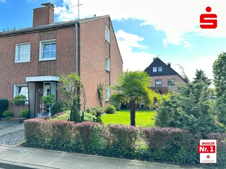 Hausansicht - Haus kaufen in Straelen - Gepflegtes Reihenendhaus in guter Lage