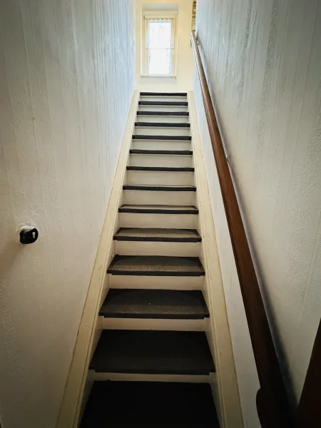 Treppe zum Dachgeschoss