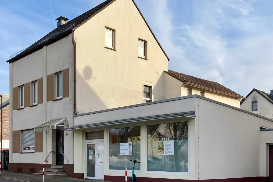 Vorderansicht - Zinshaus/Renditeobjekt kaufen in Langenfeld - WIESCHEID: MIT DER MIETE INS EIGENHEIM!