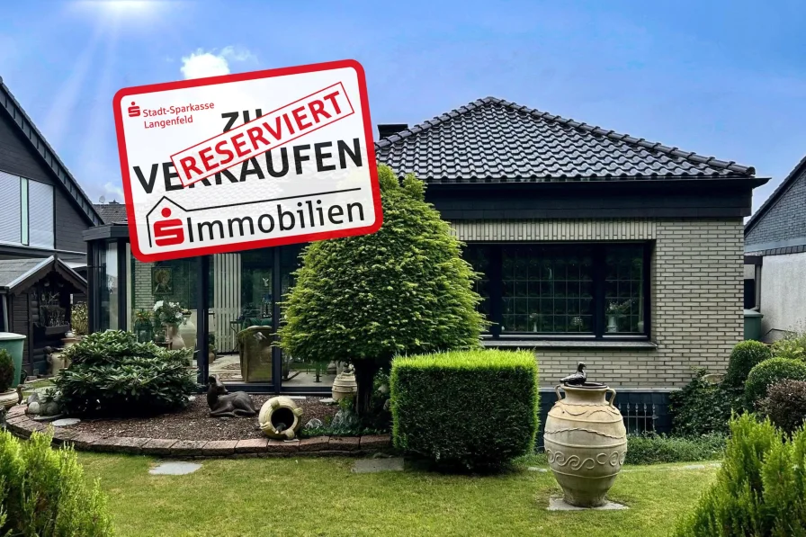 Rückansicht - Haus kaufen in Langenfeld - ZENTRAL - RUHIG - ALLES AUF EINER EBENE!