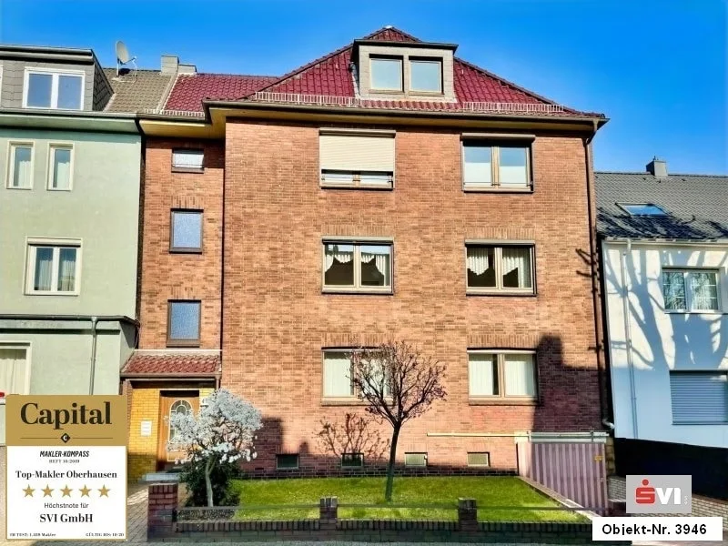 Startbild - Haus kaufen in Oberhausen - Haus mit Mehrwert. 2 große Wohnungen und 3 Garagen zur Selbstnutzung in Oberhausen-Osterfeld-Heide