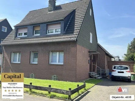 Vorderansicht - Haus kaufen in Oberhausen - Riesiges Zweifamilienhaus in Oberhausen-Sterkrade-Nord