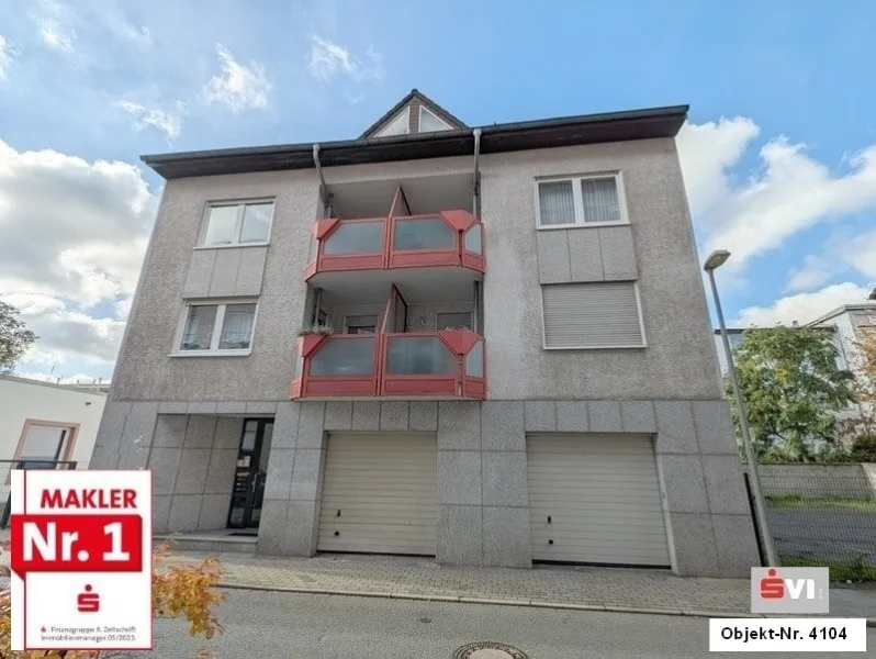 Vorderansicht - Wohnung kaufen in Oberhausen - Chice Maisonette-Wohnung mit Loggia, Terrasse und Riesengarage in Oberhausen-Stadtmitte