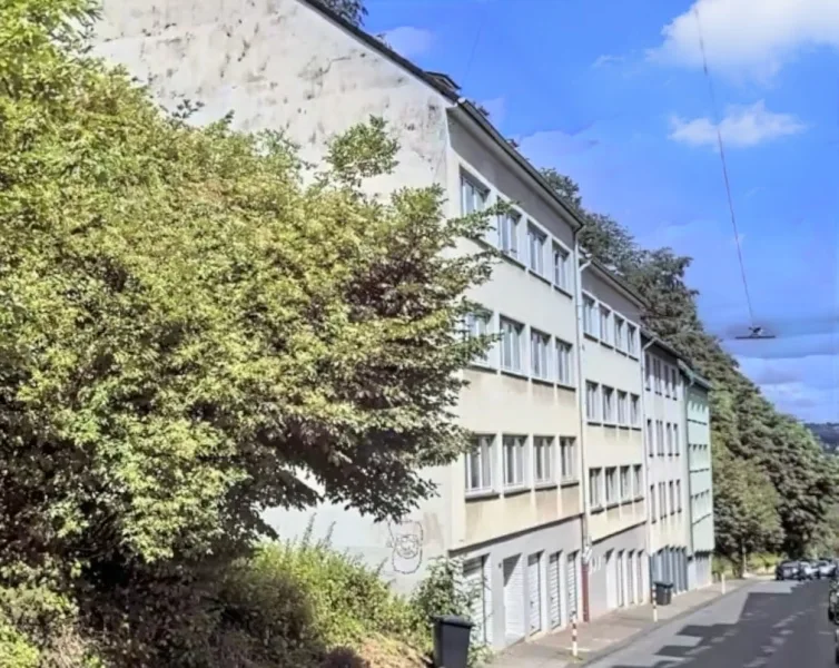 Titelbild - Wohnung kaufen in Wuppertal - Gepflegte und modernisierte 3-Zimmer Eigentumswohnung
