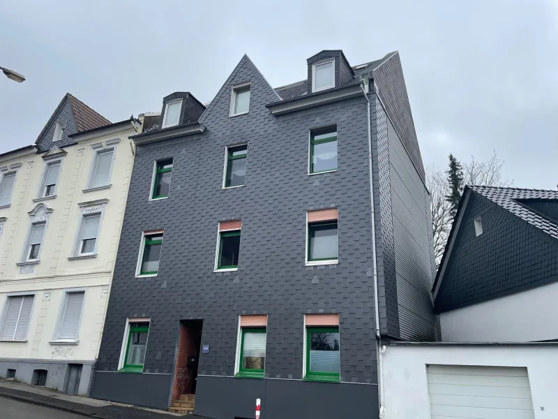 Titelbild - Haus kaufen in Remscheid - Mehrfamilienhaus mit 4 Wohneinheitenin Remscheid 