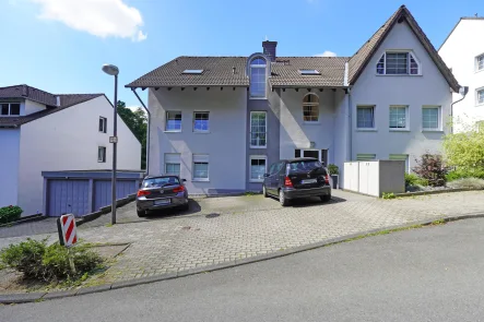 Titelbild - Wohnung kaufen in Wuppertal - Moderne Terrassenwohnung mit Blick ins Grüne