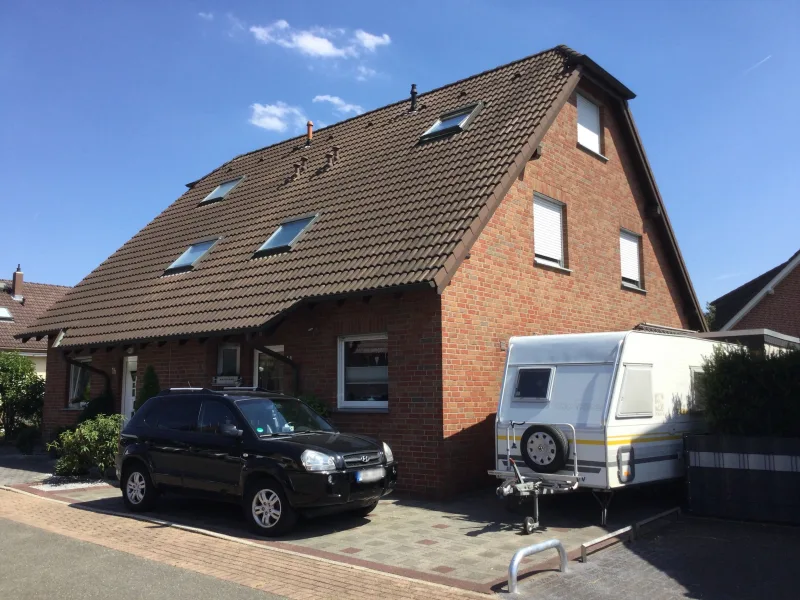 Ansicht - Haus kaufen in Kamen - Gemütliche Doppelhaushälfte mit viel Platz