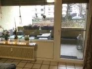 Wohnzimmer mit Ausgang zur Loggia