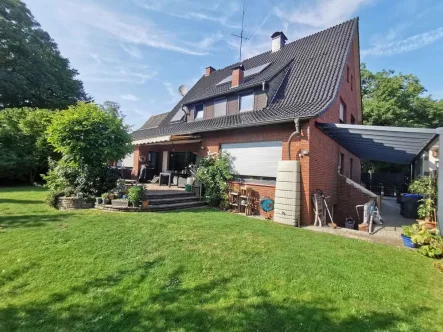 Gartenansicht - Haus kaufen in Werne - Modernisiertes 1-2 Familienhaus mit Büro/Einliegerwohnung im Kern der Stadt Werne