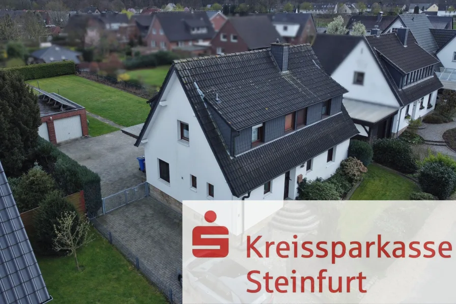 Straßenansicht  - Haus kaufen in Ibbenbüren - Wohnen in guter Nachbarschaft