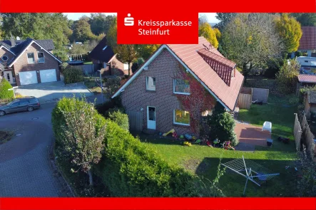 Seitenansicht - Haus kaufen in Hörstel - Attraktives Einfamilienhaus in Hörstel – Ideal für eine Familie