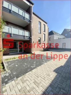 ETW 1 im Erdgeschoss mit Terrasse u. Stellplatz - Wohnung kaufen in Selm - ERSTBEZUG! BARRIEREFREIE NEUBAU ETW IN DER SELMER ALTSTADT!