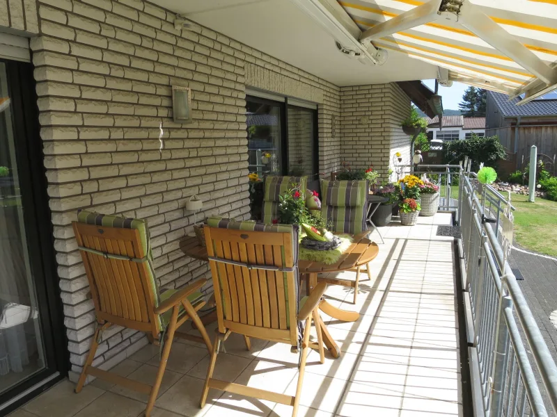 Balkon im Erdgeschoss mit Gartenzugang