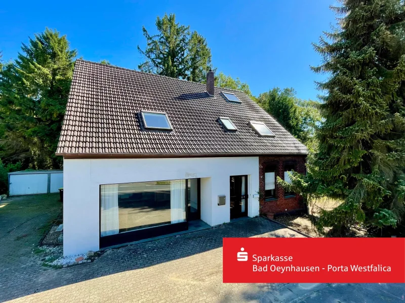 Titelbild - Haus kaufen in Bad Oeynhausen - Vielseitiges Wohnhaus: Platz für die ganze Familie mit großem Grundstück