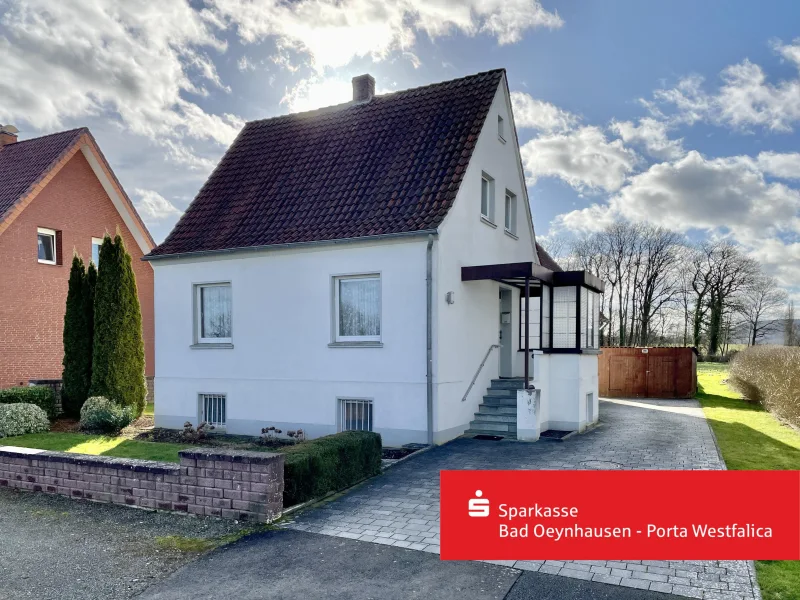 Hauptansicht - Haus kaufen in Porta Westfalica - Zeitloses Einfamilienhaus trifft Natur und Ruhe